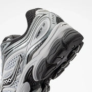 Saucony ProGrid Omni 9 — Microchip / Gris